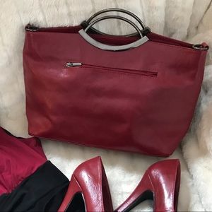 NWOT Oriente red genuine leather bag.Made in Spain